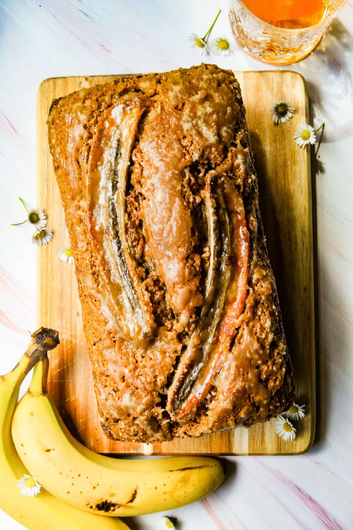 banana bread and a glass of bourbon