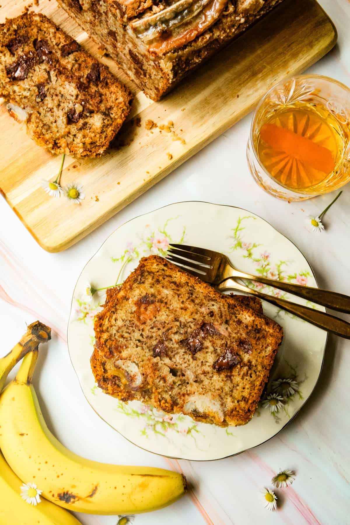 banana bread and a glass of bourbon