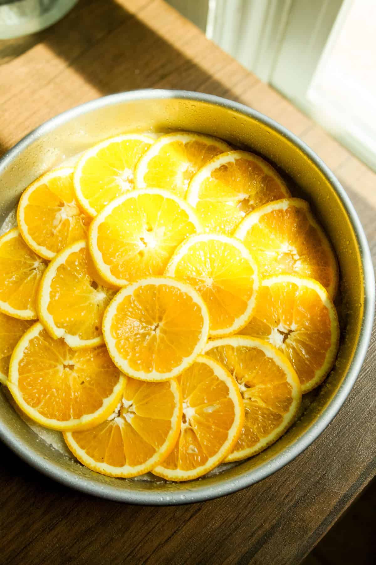 orange slices in a cake pan